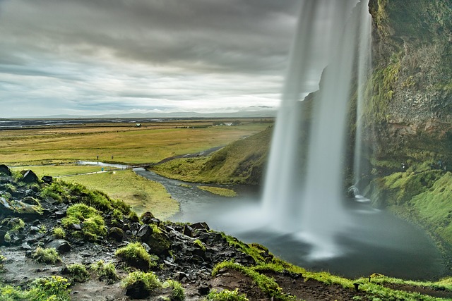 photographer shooting waterfall in British Columbia long exposure